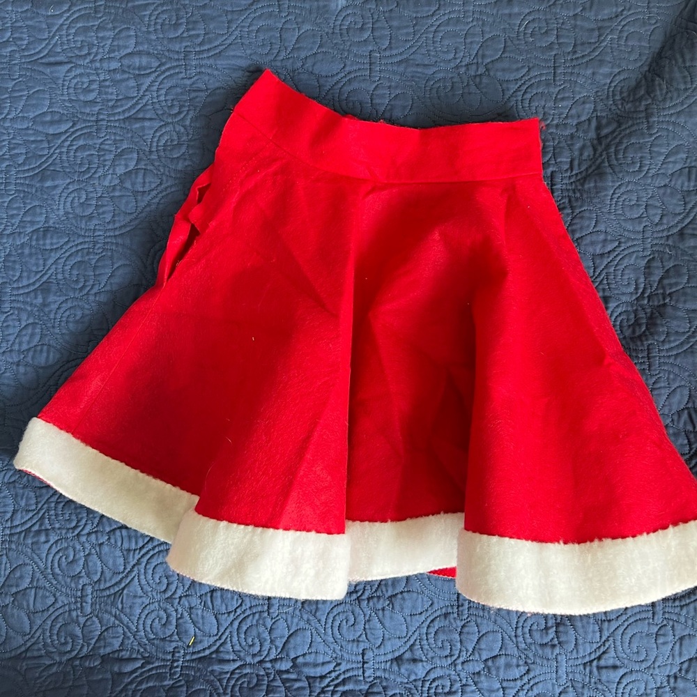 Size 28 waist Santa felt Christmas skirt.  Includes felt Santa shoe covers.